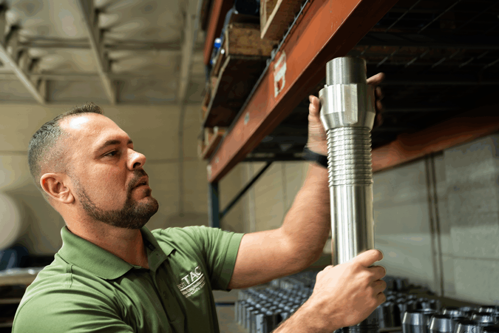 Threading an upper cone onto an anchor mandrel